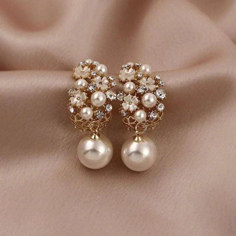 Elegante oorbellen met bloemvormige kralen | Goud