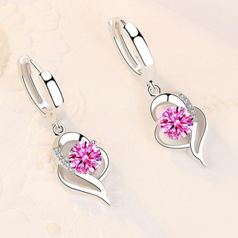 Oorbellen van zilver met ingelegde zirkonia bloemen | Witgoud